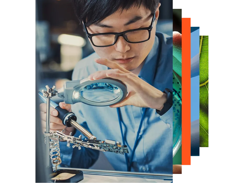 A group of diverse people collaborating around a computer, focused on their work and sharing ideas.