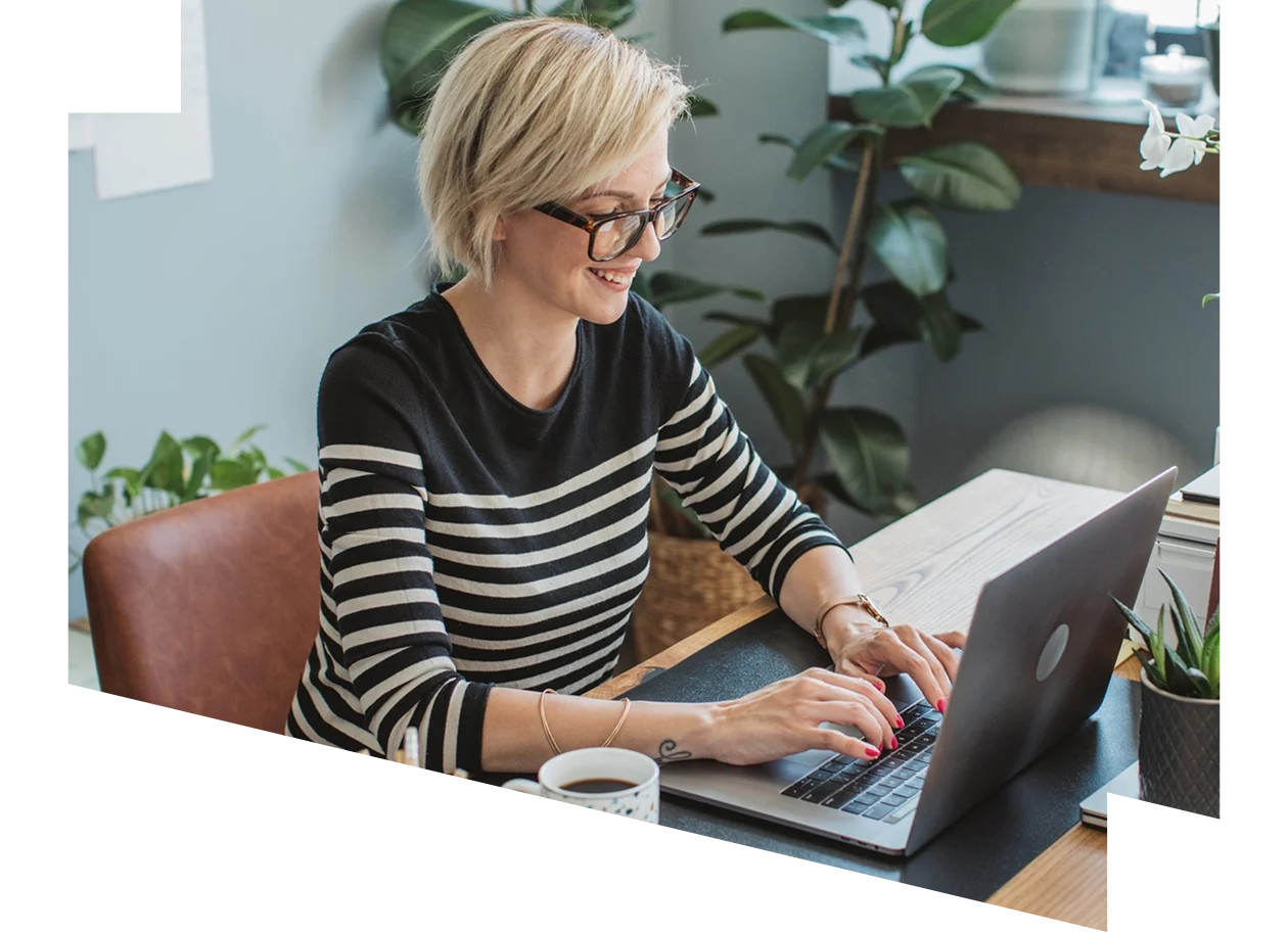 Female librarian working on her laptop