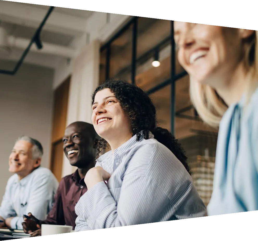 Smiling colleagues in a meeting room