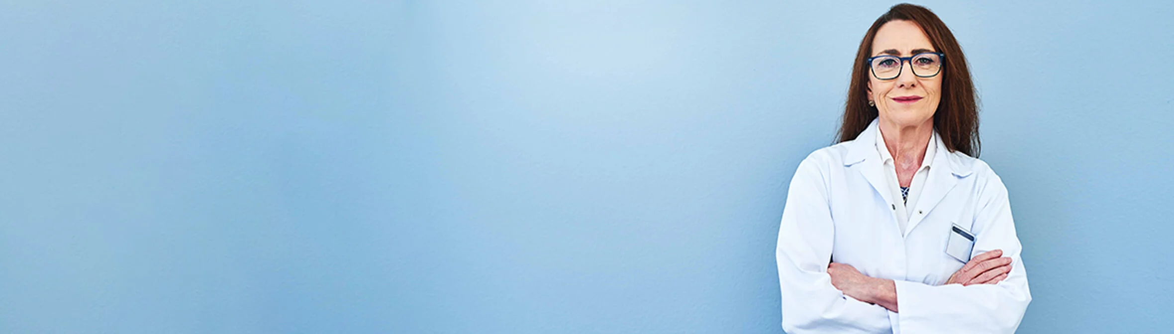 female scientist with glasses on a blue background