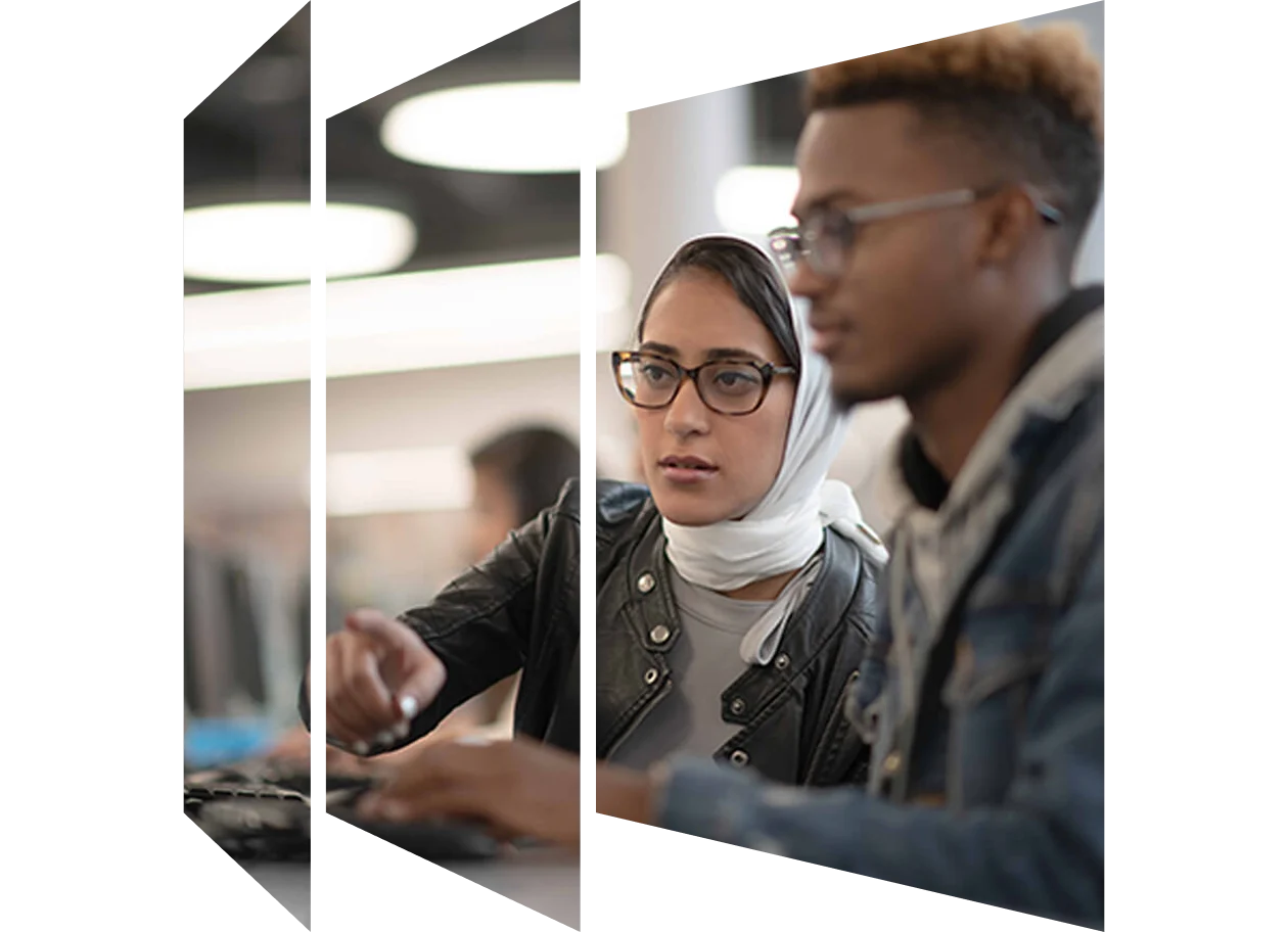 Students looking at monitor