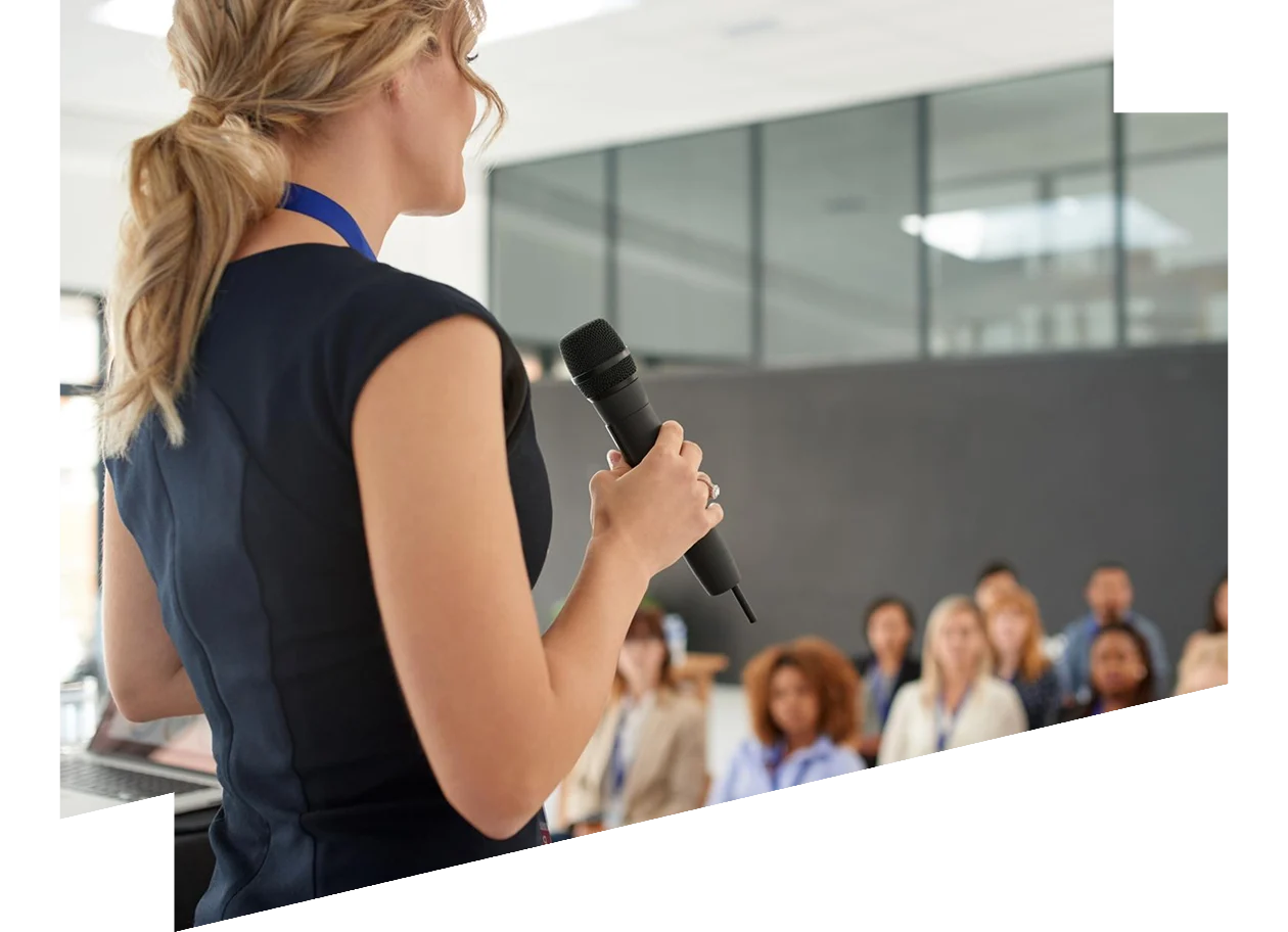 Shot of a young businesswoman delivering a presentation at a conference