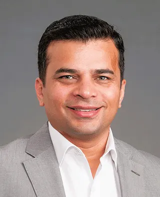 Dr. Dhanendra Tomar