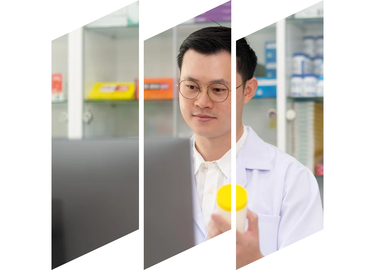 Young adult male in medical coat.