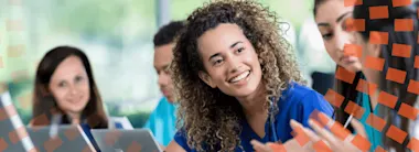 Smiling nursing students in a classroom