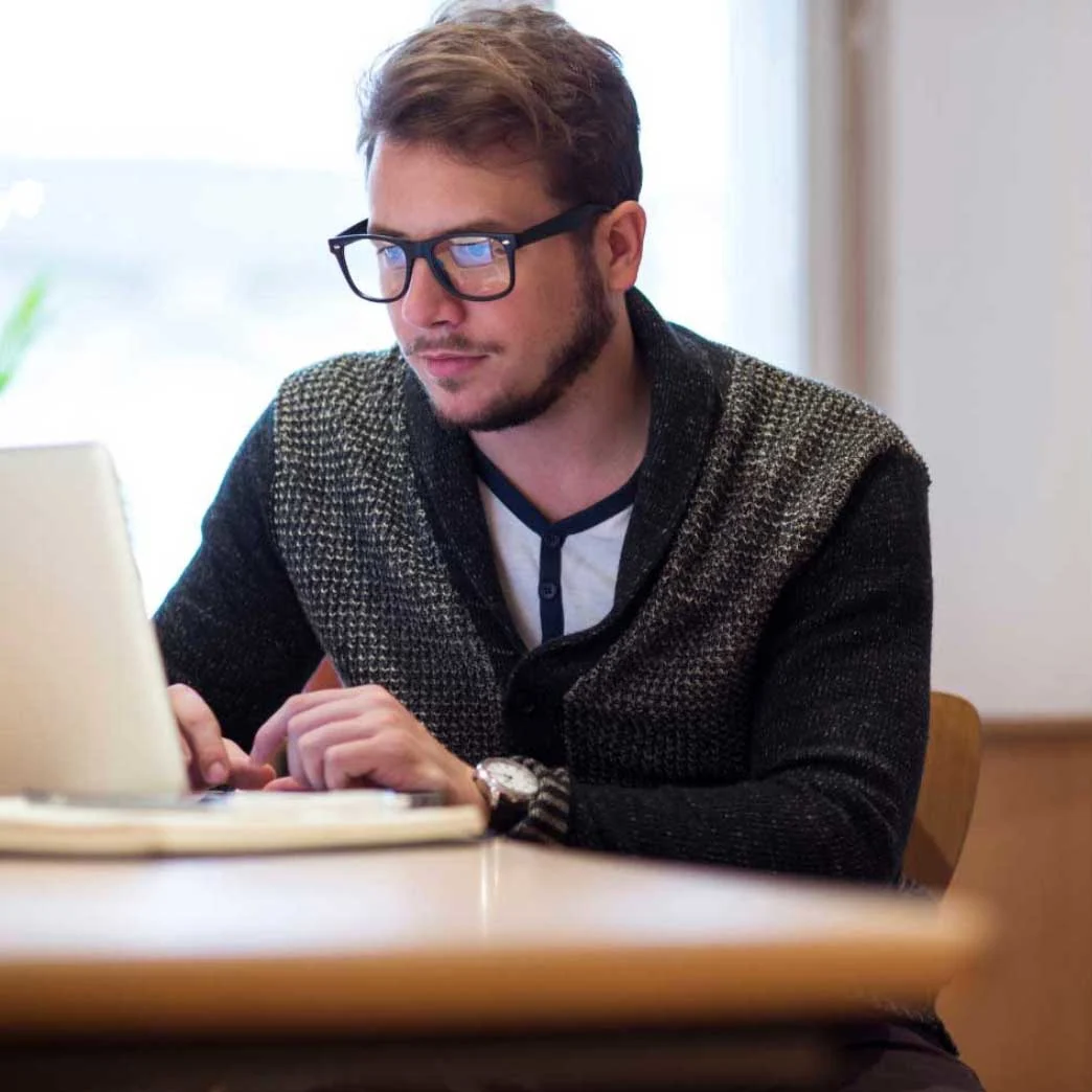 Young student studying in library