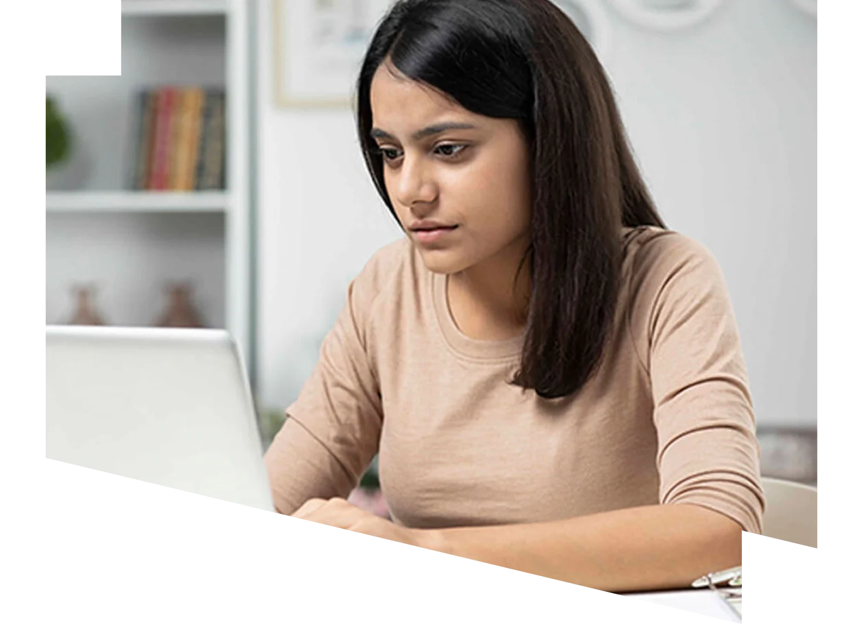 Young female studying on a laptop