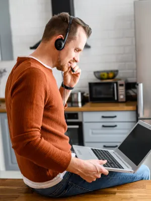 Man having an online call with headphones 