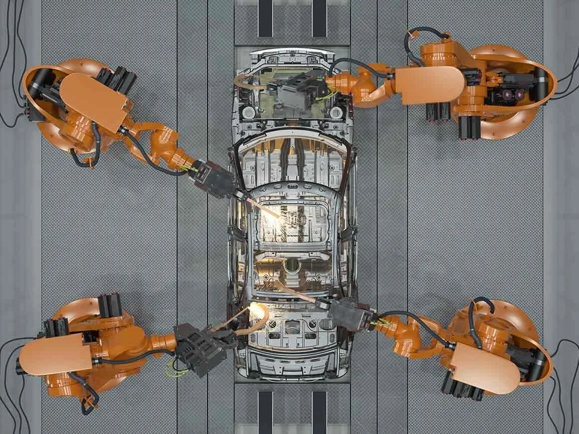 Welding robots building car frame