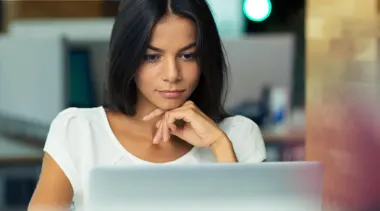 woman studying computere - drug information