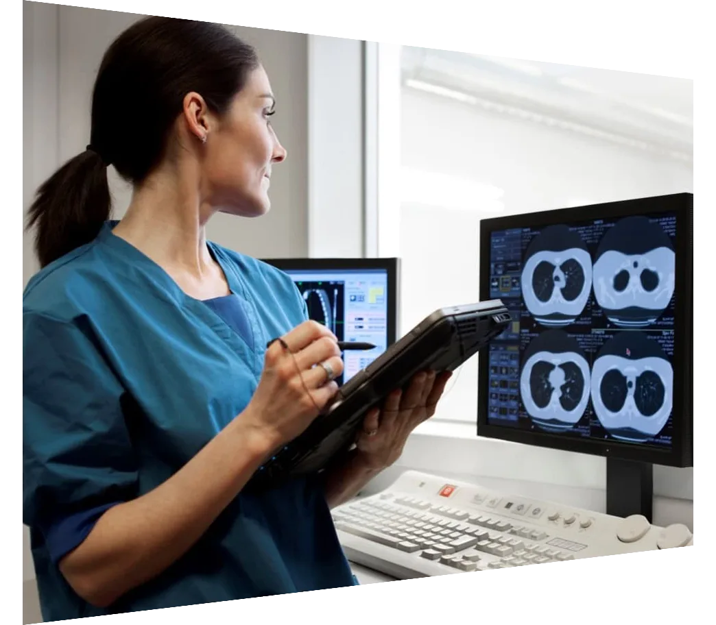 Radiologist looking at scan results on screen