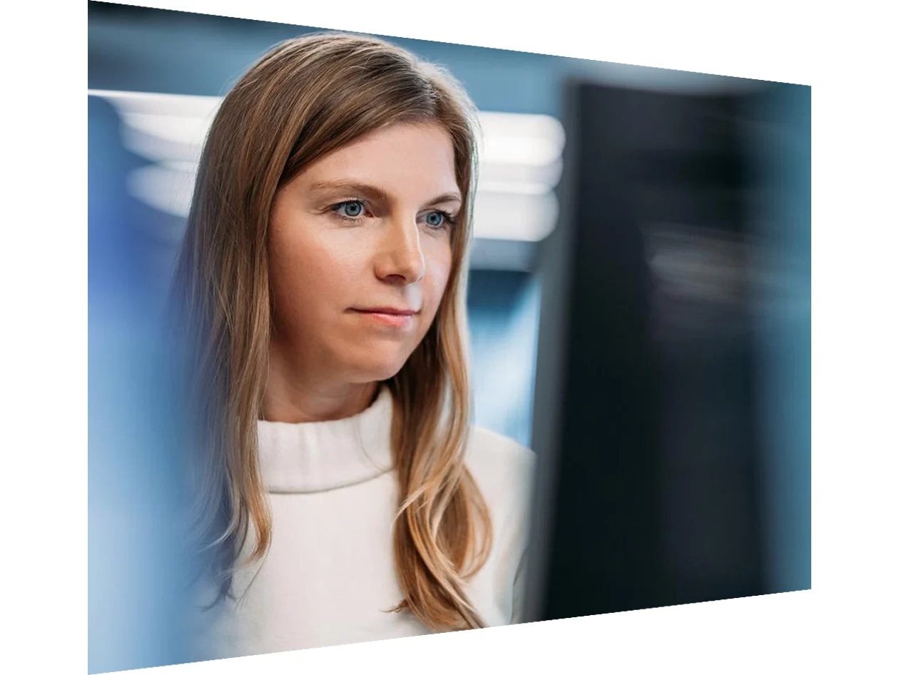 Woman sitting at computer doing research