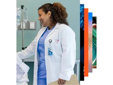 Female doctor with stethoscope looking at a window