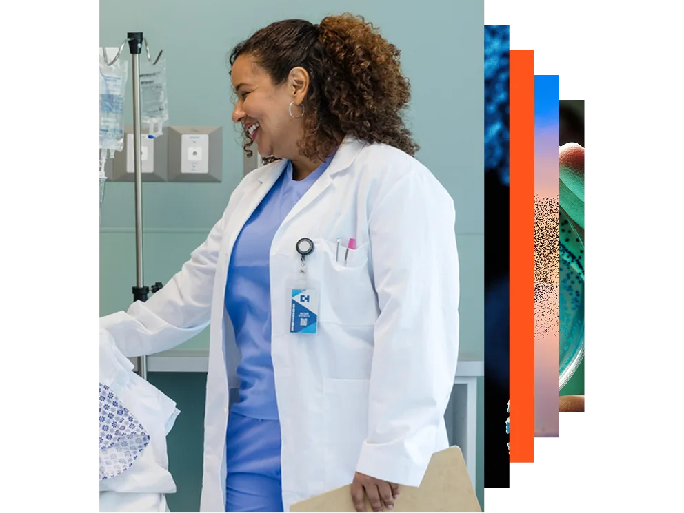 Female doctor with stethoscope looking at a window