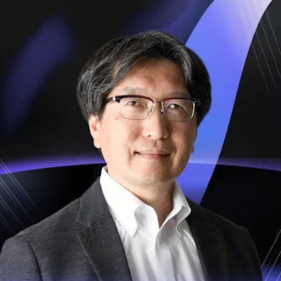 友岡 賢二 氏
