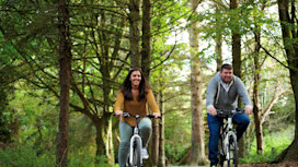 Cycling in Hafan y Mor's woodland trail