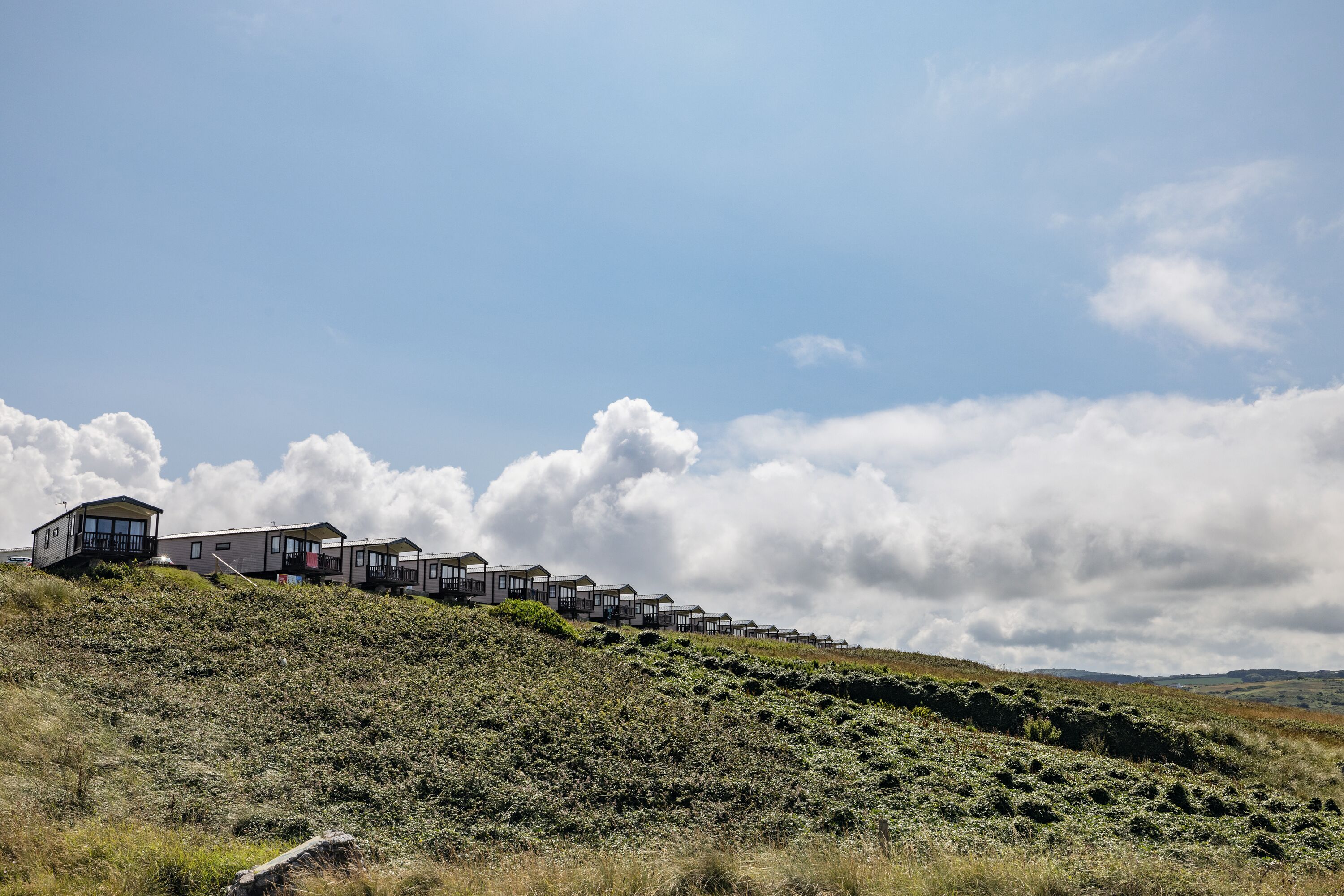 Boys playing outside the caravan