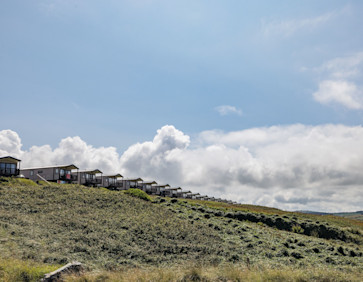 Boys playing outside the caravan