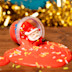 A Santa sits on red slime made in Festive Slime Creations.