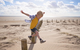 Jump for joy at the beach