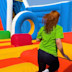 An activity team member at Haven Hopton tries out the new Inflatable Arena which is open now