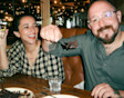 A couple enjoying food and drink at a Haven restaurant