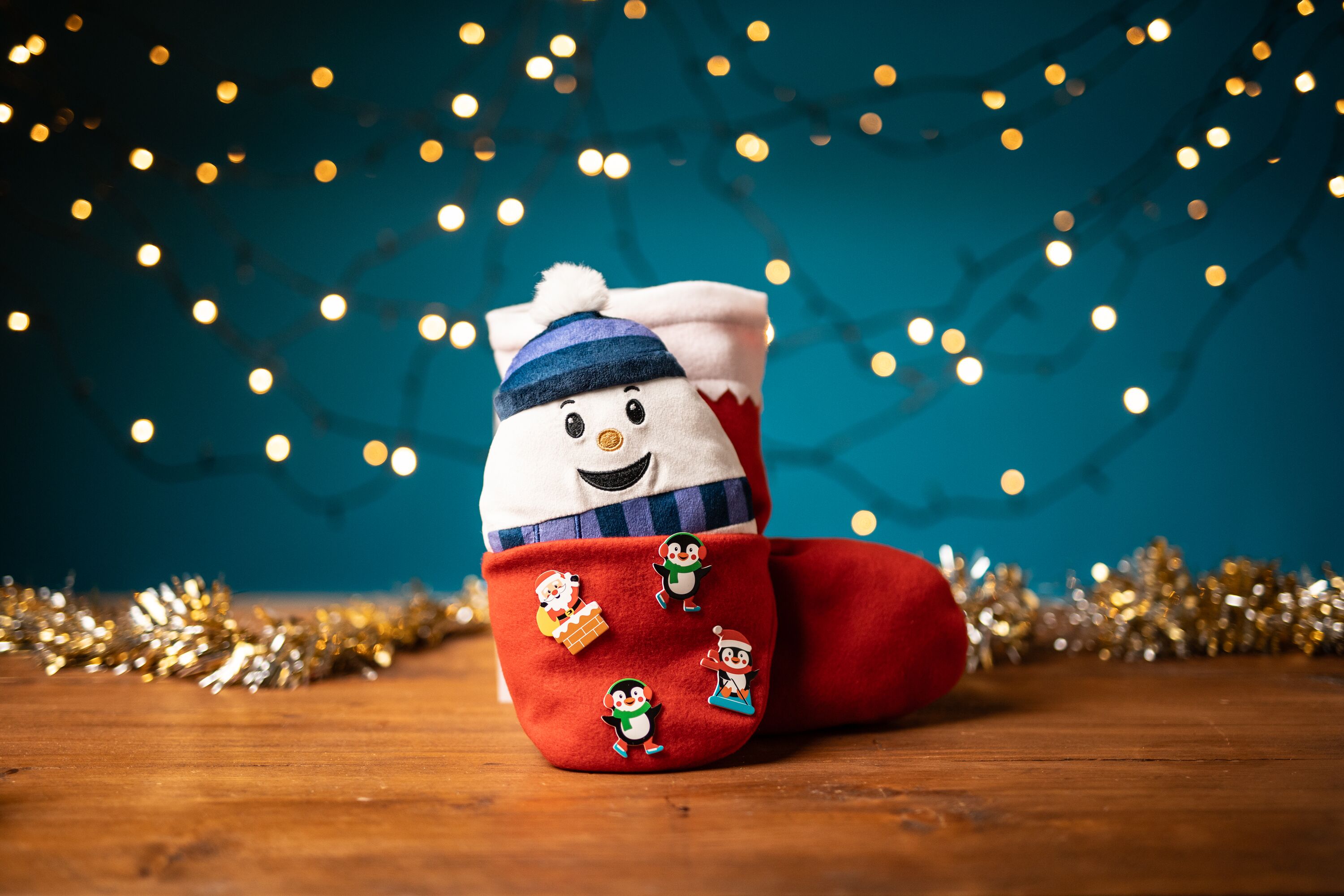 A snowman-themed stocking handmade at Haven.