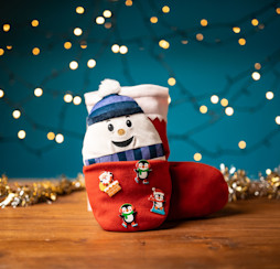 A snowman-themed stocking handmade at Haven.