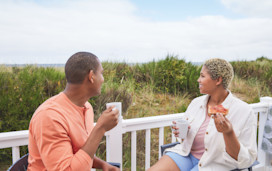 Couple enjoying view from their decking