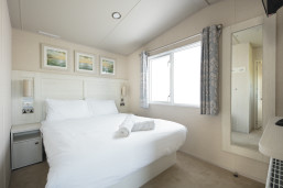 Main bedroom in Prestige caravan at Caister-on-Sea