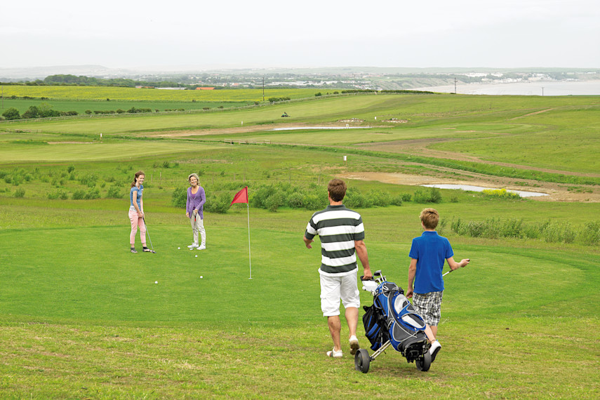 2. Play a round of golf