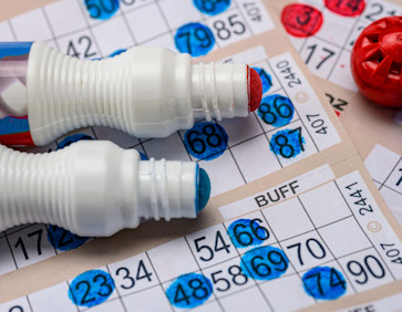 Bingo dabbers and bingo books.