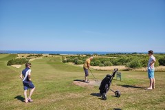 Golfers on one of the holes at the golf course at Reighton Sands