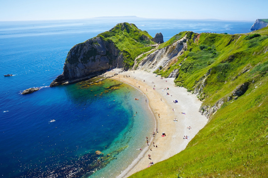 5. Visit the peacefulness at Lulworth Cove