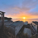 The sun setting over the bay