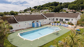 The outdoor pool at Penally Court holiday park.