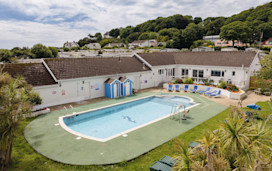 The outdoor pool at Penally Court holiday park.