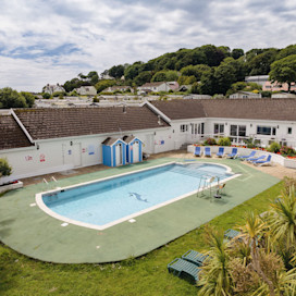 The outdoor pool at Penally Court holiday park.