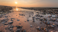 The rocky beach at Doniford Bay