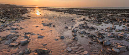The rocky beach at Doniford Bay