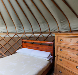 Representation of a double bed in a Yurt
