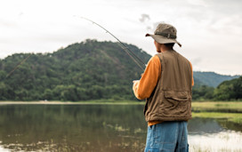 A man fishing in a lake