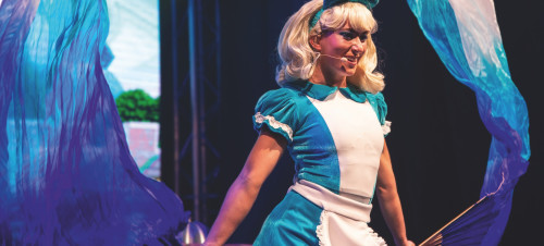 Alice takes to the stage in the Mad Hatters Circus at Haven holiday parks