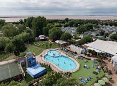 An aerial view of Burnham-on-Sea's Adventure village, with the coastline just visible behind it.