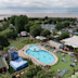 An aerial view of Burnham-on-Sea's Adventure village, with the coastline just visible behind it.
