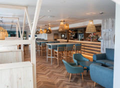 The interior seating and bar area at Kent Coast Yacht Club