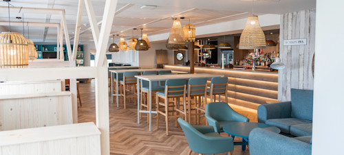 The interior seating and bar area at Kent Coast Yacht Club