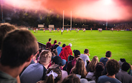 Taking in the action at a rugby match