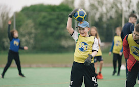 Children between 5-12 years playing football together with Football Fun Factory.