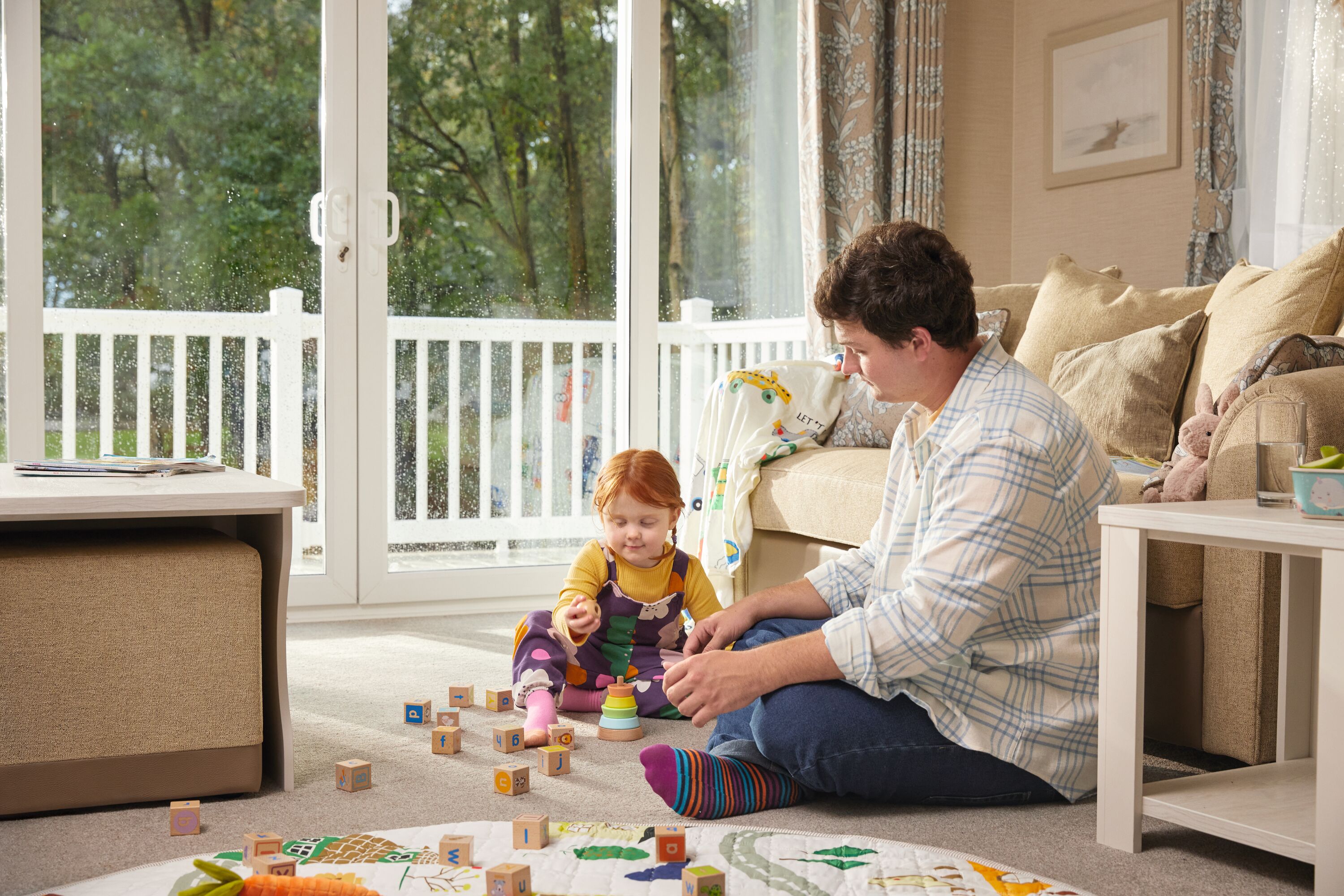 Family playing games in a caravan